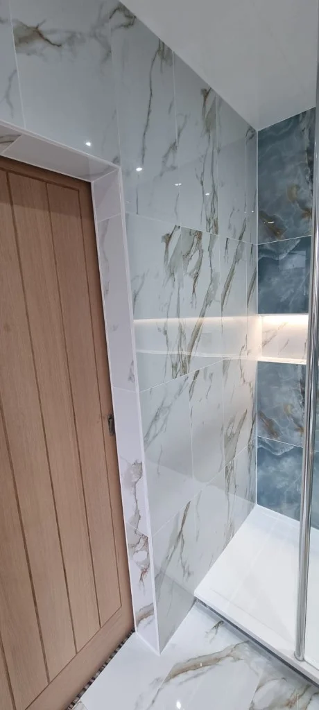 LED-lit shower niches with concealed chrome valve in Blyth bathroom