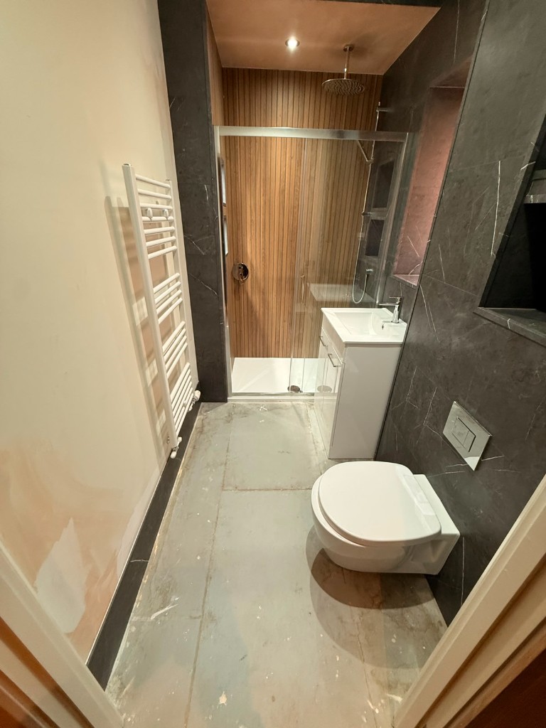 Vanity unit and tiled window reveal in a Durham bathroom refit