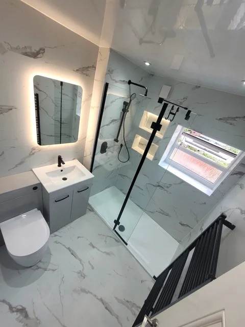 Bathroom in Ramsbottom with SPC marble wall panels, walk-in shower and black fittings