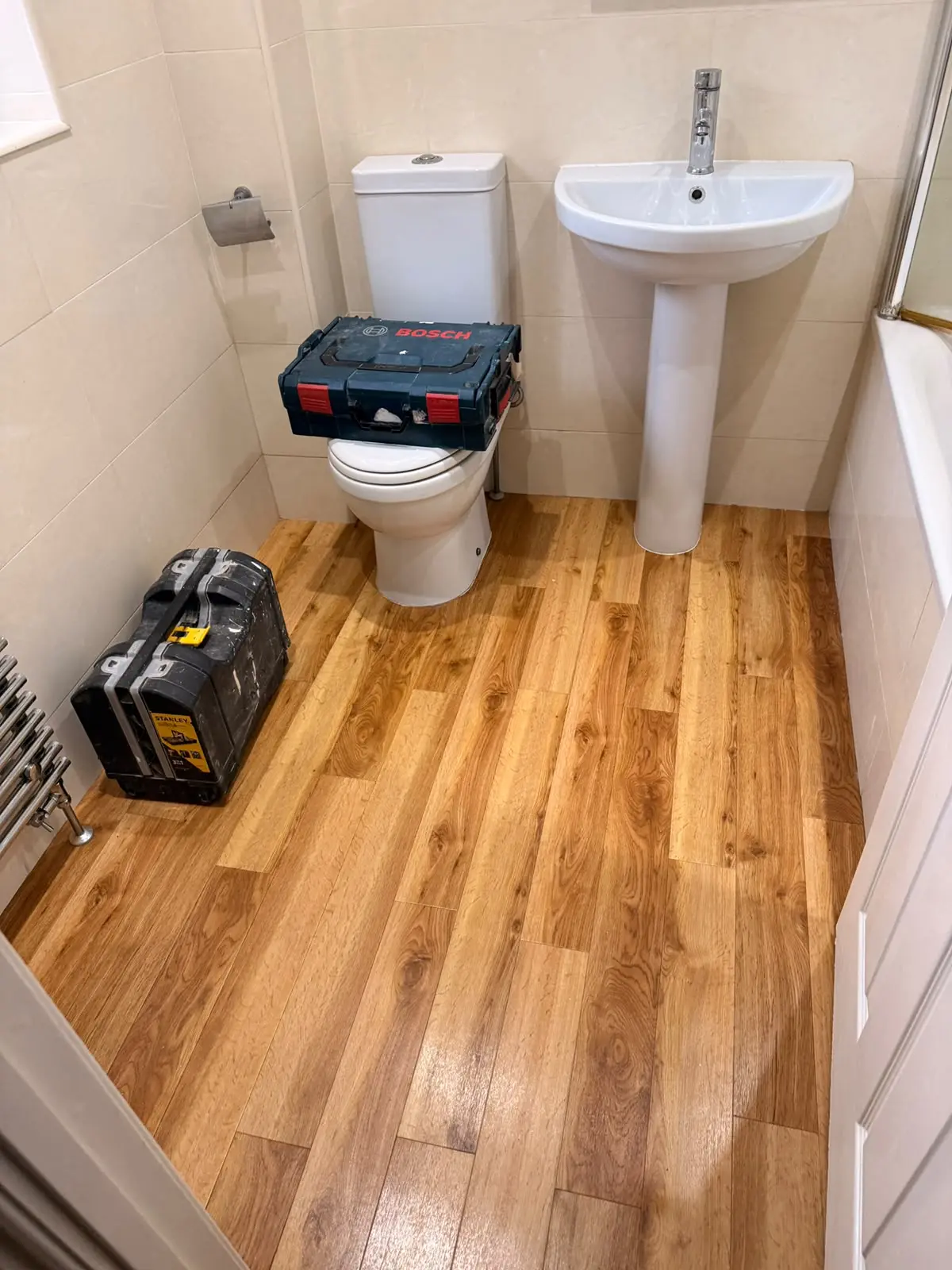 Pedestal basin and close-coupled toilet before bathroom renovation in Chester-le-Street